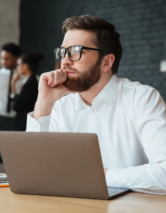 Business owner analyzing GoHighLevel dashboard customization strategy